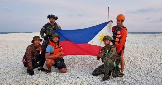China and the Philippines both plant their flags on the same disputed sandbar