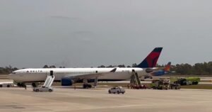 Delta plane engine catches fire at Orlando airport, passengers evacuate on slides