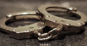 Texas county official injured and husband killed in stabbing, grandson under arrest, police say