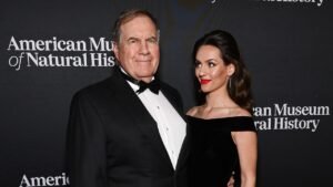 Bill Belichick, Jordon Hudson attend Hurricanes playoff game