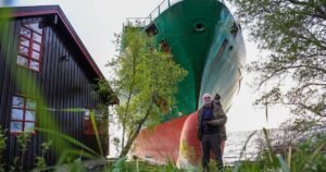 Norwegian man wakes up to a cargo ship in his garden