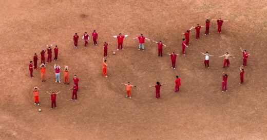 Migrants form SOS sign in Texas detention center, fear notorious El Salvador prison