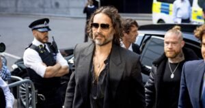 Russell Brand arrives at London court to face rape and sexual assault charges