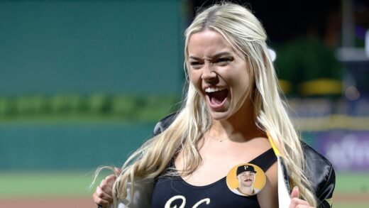 Livvy Dunne cheers on SI models’ first pitch before Paul Skenes takes mound