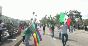 Police move to clear streets as 20,000 protest in Los Angeles