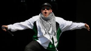 Kneecap rapper Mo Chara says he’s a ‘free man’ as band draw huge Glastonbury crowd | Ents & Arts News