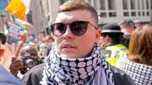 Kneecap rapper appears in court on terror charge – as protesters gather outside | Ents & Arts News