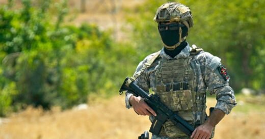 Kurdish PKK militants begin handing over weapons in cave in Iraq