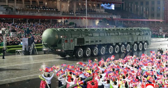 North Korea displays new long-range ICBM at a military parade celebrating Kim Jong Un