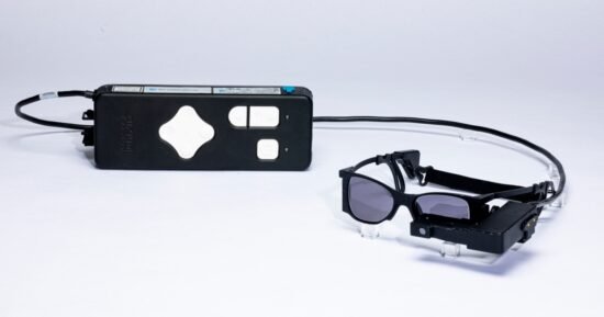 With a tiny eye implant and special glasses, some legally blind patients can read again