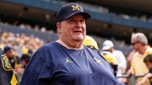 Biff Poggi eyes full-time job amid Michigan’s head coaching search