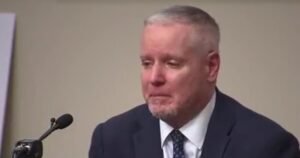 Alleged gunman’s father accused in school shooting takes stand at trial