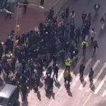 Protesters gather at Columbia University after school says DHS detained student