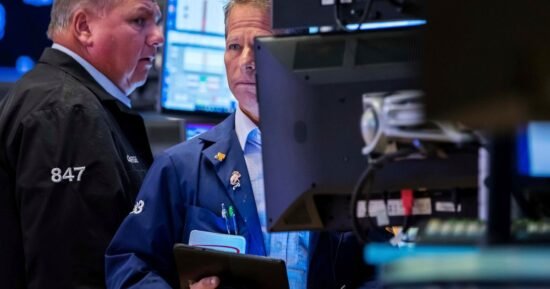 Dow slides nearly 800 points as AI and tariff risks rattle investors