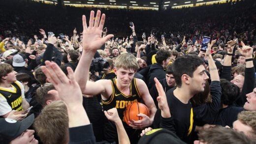 Iowa court storm leads to coach smacking fan’s phone; apology issued by Hawkeyes