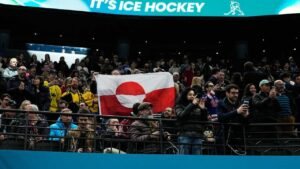 Fans raise Greenland’s flag to protest US Olympic hockey win over Denmark