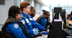 Long security lines form at airports as TSA agents miss first full paycheck amid DHS standoff