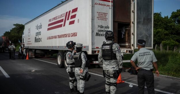 Authorities find 229 migrants calling for help in back of truck in Mexico