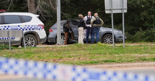 Fugitive accused of killing 2 Australian police officers is shot dead after 7-month manhunt