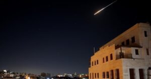 Fewer missiles, drones pierce Israeli air defenses as Iran war persists