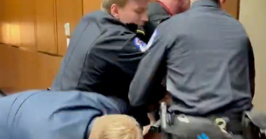 GOP senator joins police in ejecting anti-war protester from Capitol Hill hearing