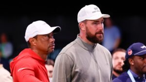 Travis Kelce, Kai Trump chat at TGL event