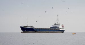 Oil prices plunge 10% after Iran says Strait of Hormuz is open for commercial vessels