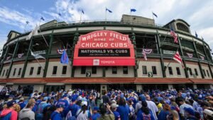 Cubs fan spotted working on laptop during cold Wrigley Field game
