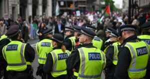 London police out in force to deal with rival rallies and a soccer final