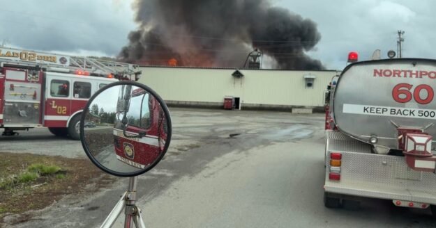 Explosion at Maine lumber mill leaves at least 10 injured as firefighters battle intense blaze