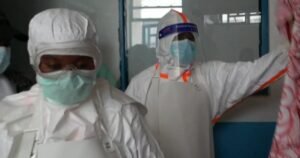 U.S. tightens Ebola travel restrictions as new cases emerge abroad