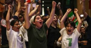 Fans cheer on Iran from Tehran during the World Cup