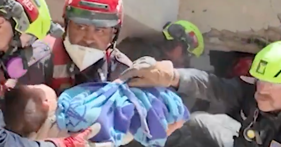 Videos show U.S. rescue team pull mother, 9-month-old baby from rubble in Venezuela: “The delivery of hope”