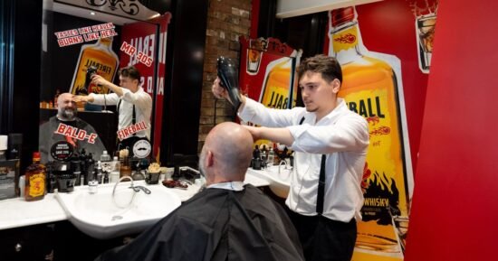 Pitbull fans shave their heads after record-breaking concert to win huge prize