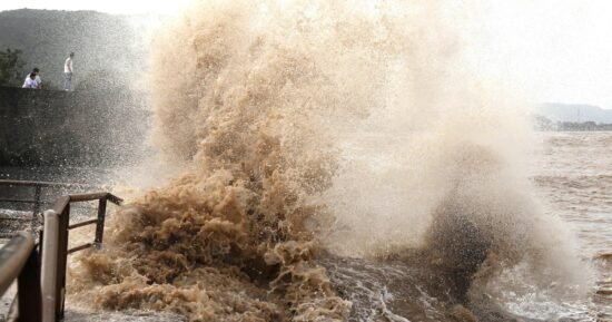 Former super typhoon Bavi weakens but still lashes China with powerful winds, rain