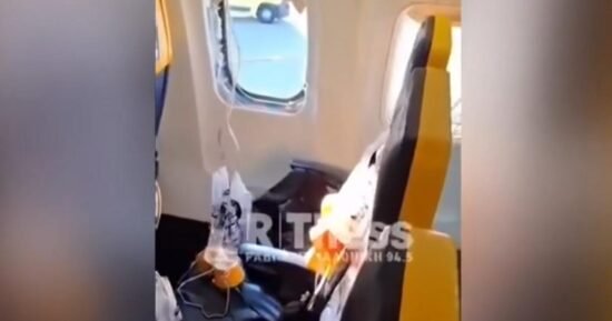 Passenger almost sucked out of plane after window breaks during flight