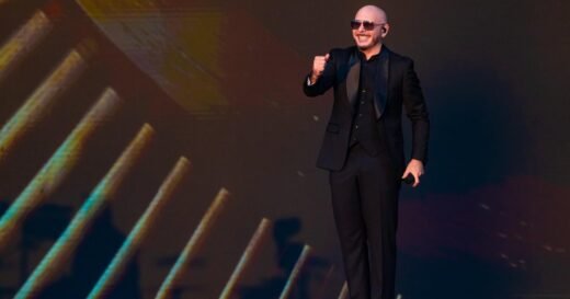 Pitbull sets Guinness World Record for largest gathering of people wearing bald caps