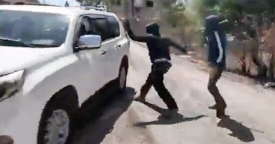 Palestinian woman and NBC News team attacked by masked Israeli settlers in West Bank