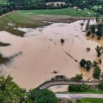 Floodwaters submerge Midwest neighborhoods still bracing for more severe storms