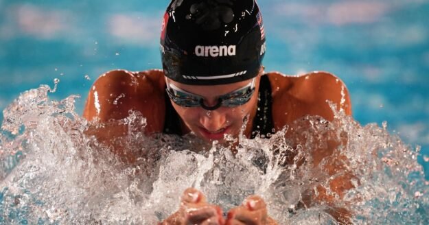 Swimmer Kate Douglass sets 50-meter freestyle world record in Pan Pacific prelims