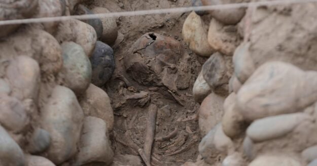 Skeletal remains believed to be person sacrificed during ritual unearthed by archaeologists in Peru
