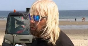 Maine lifeguard says shark dragged him 5 feet underwater as officials warn of increased sightings