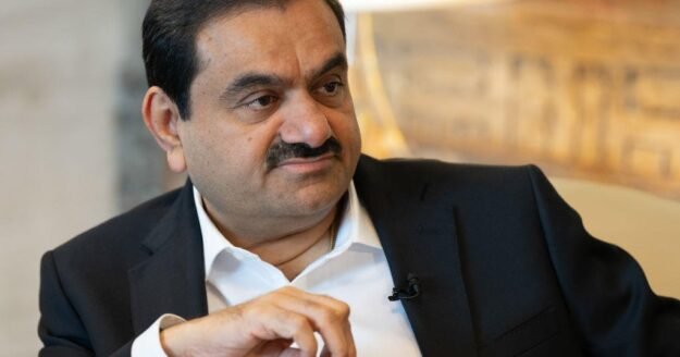 Judge grants DOJ’s request to dismiss charges against billionaire Adani, but sharply criticizes DOJ officials