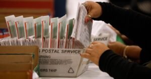 24 states sue to block new Postal Service rules for mail voting ahead of midterms