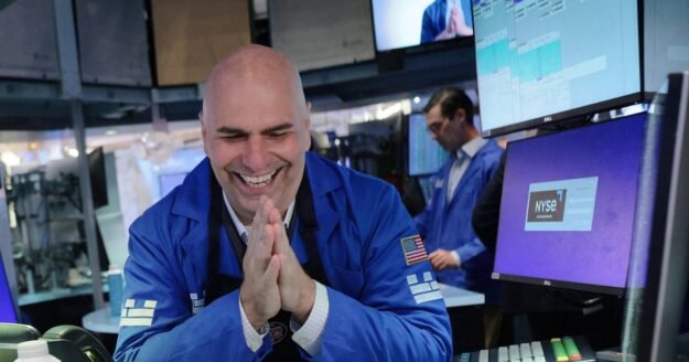 Dow soars 1,000 points on strong corporate earnings and hopes of Iran deal