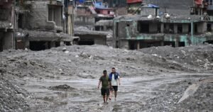 Nepal on high alert for fresh flooding after river levels rise as death toll soars past 800