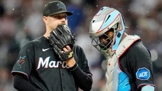 Marlins outfielders collide and knock ball over wall for a home run