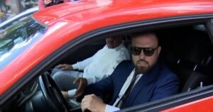 Watch: Lawyer hits car while trying to escape reporters outside courthouse