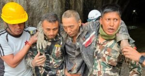 Third worker rescued from Nepal tunnel, woman found alive in rubble 10 days after devastating floods