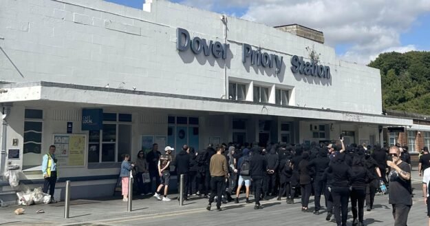 Masked U.K. anti-migrant protesters condemned for “thuggish and intimidating” behavior